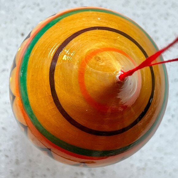 Handcrafted Wooden Hanging Ornament With Vibrant Tribal Patterns - Picture 7 of 9